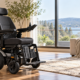 Motorized wheelchair with joystick controls in a bright living room